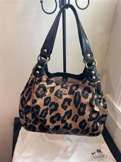 134 results for coach ocelot handbags .